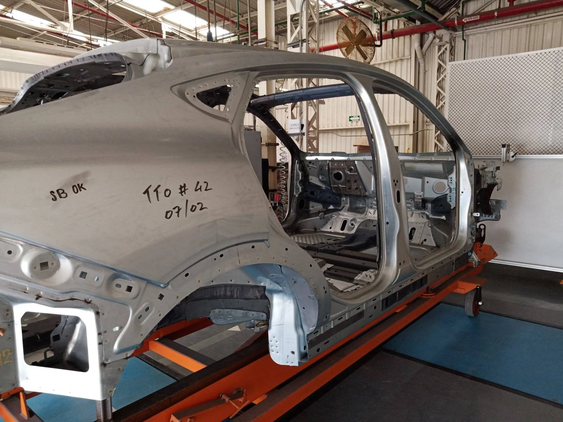 Ford Mustang Mach-E Naked Mach-E shell / frame (body in white) and Iconic Silver Preproduction seen in Mexico factory Mustang Mach-E Shell Frame Mexico Factory 3