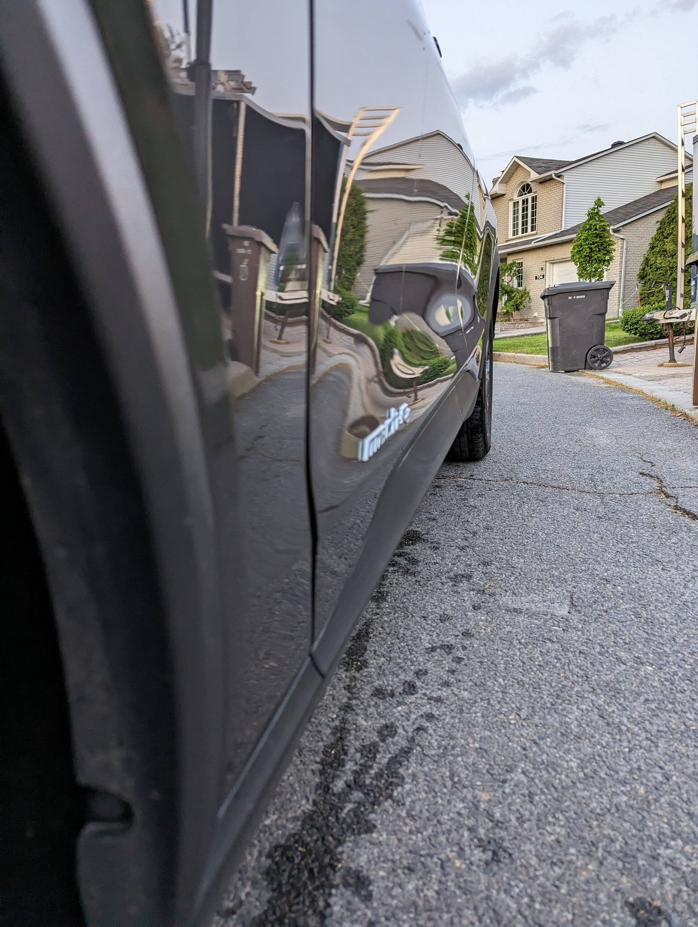 Ford Mustang Mach-E 2 dots of rust on passenger side, uneven driver door with front fender? PXL_20230529_004029273