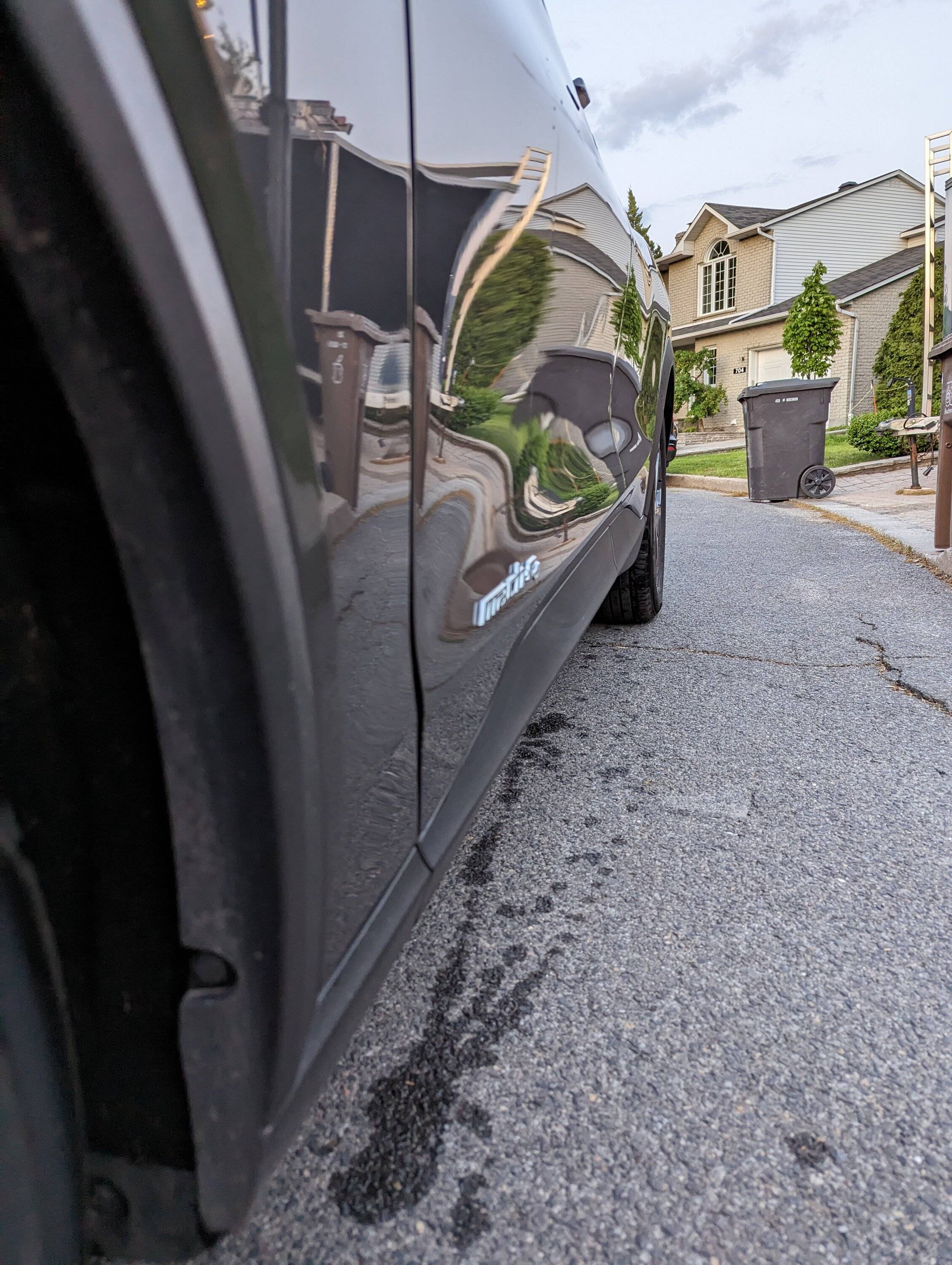 Ford Mustang Mach-E 2 dots of rust on passenger side, uneven driver door with front fender? PXL_20230529_004026345