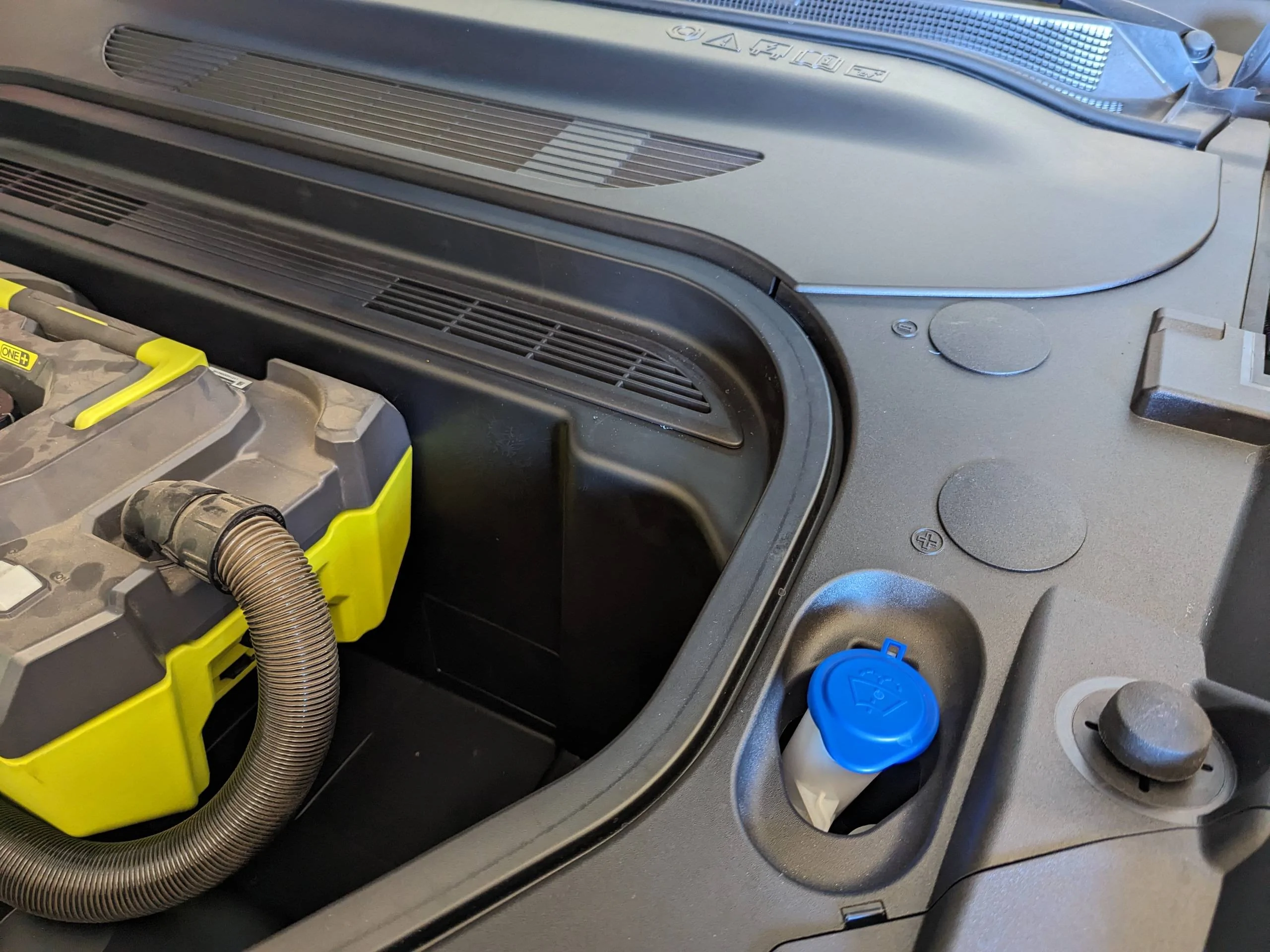 Ford Mustang Mach-E Caps for access holes drilled for 12v battery? PXL_20230817_210726053