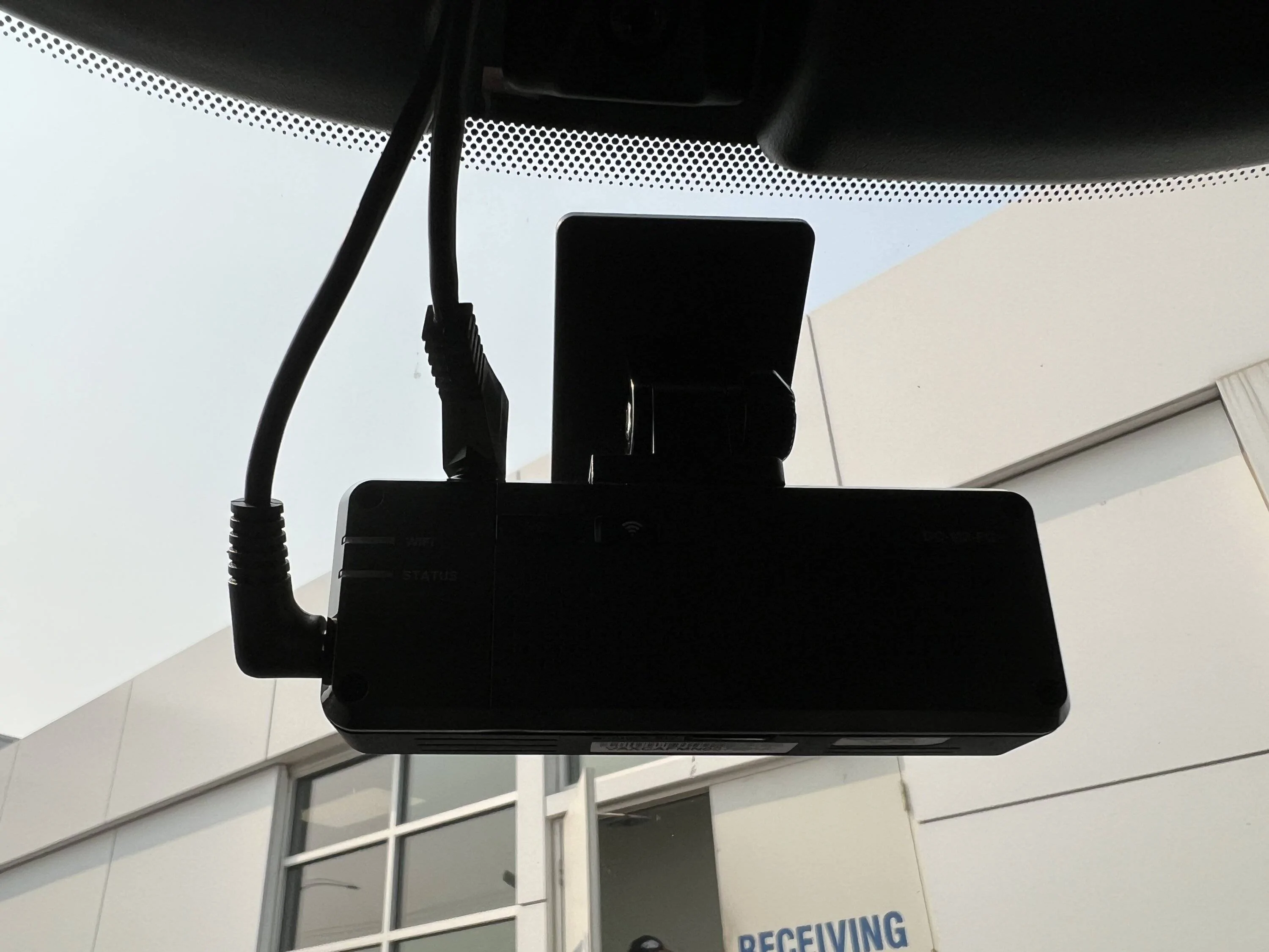 Ford Mustang Mach-E Ford dealer installed the Thinkware dash cam. AITA for thinking this wasn't a great job? IMG_4071