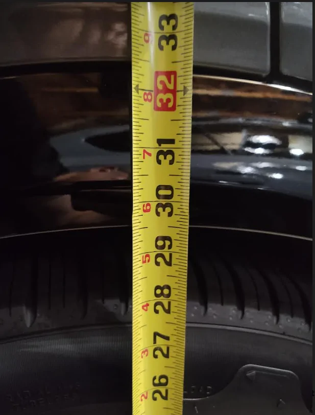 Ford Mustang Mach-E Ok, so I need help.. lowering Mach-E suspension to reduce wheel gap 1696553145259