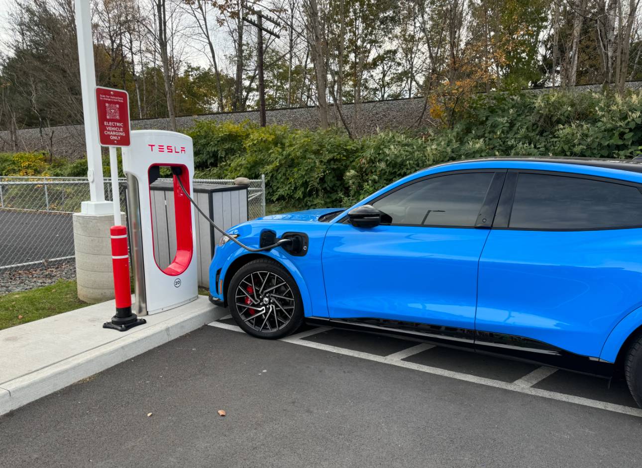 Ford Mustang Mach-E First Tesla Superchargers with "Magic Dock" CCS Adapter are online... and charged up a Rivian IMG_1945