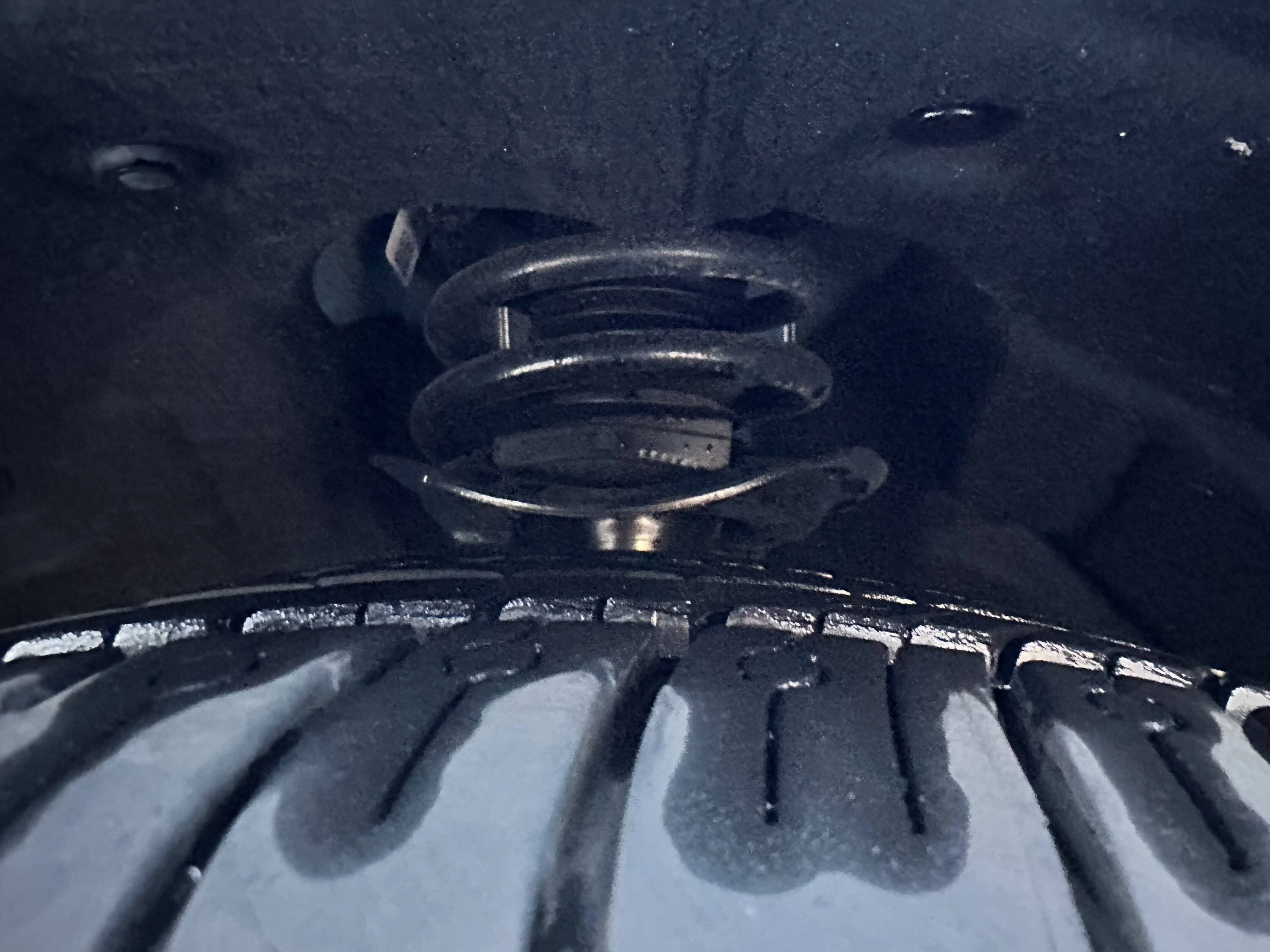 Ford Mustang Mach-E Bent shield on suspension IMG_6541