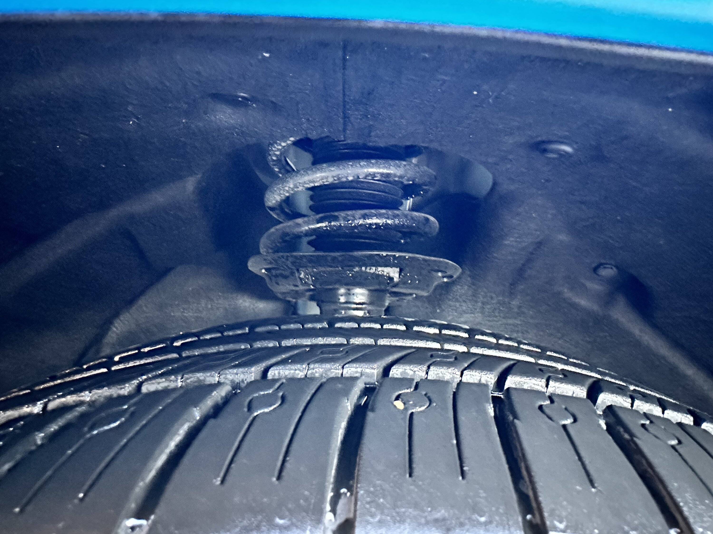 Ford Mustang Mach-E Bent shield on suspension IMG_6543