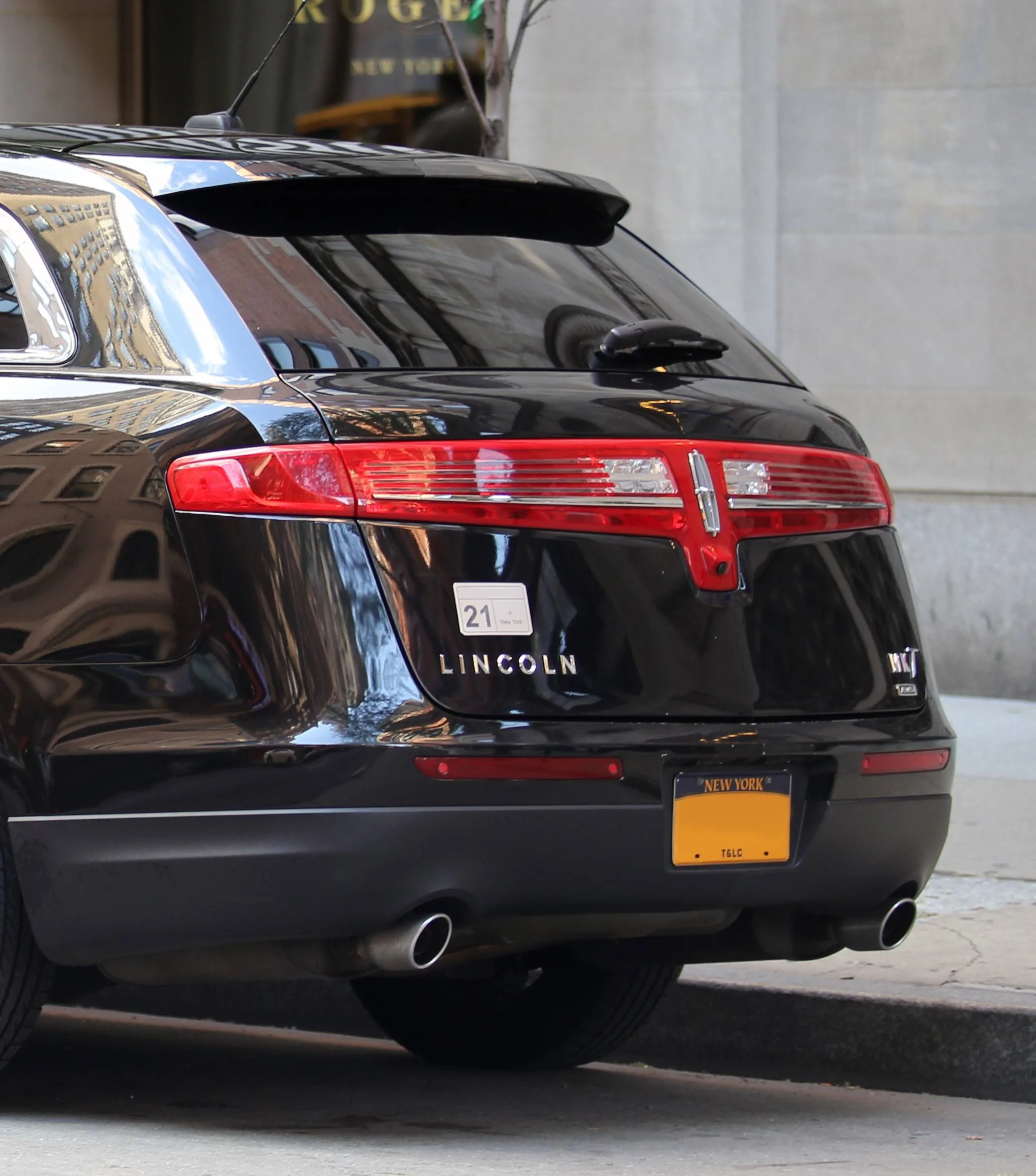 Ford Mustang Mach-E Mach-E vs. 2024 Porsche Macan EV - design, specs, price 2013_Lincoln_Mk_T_Town_Car_NYC_rear