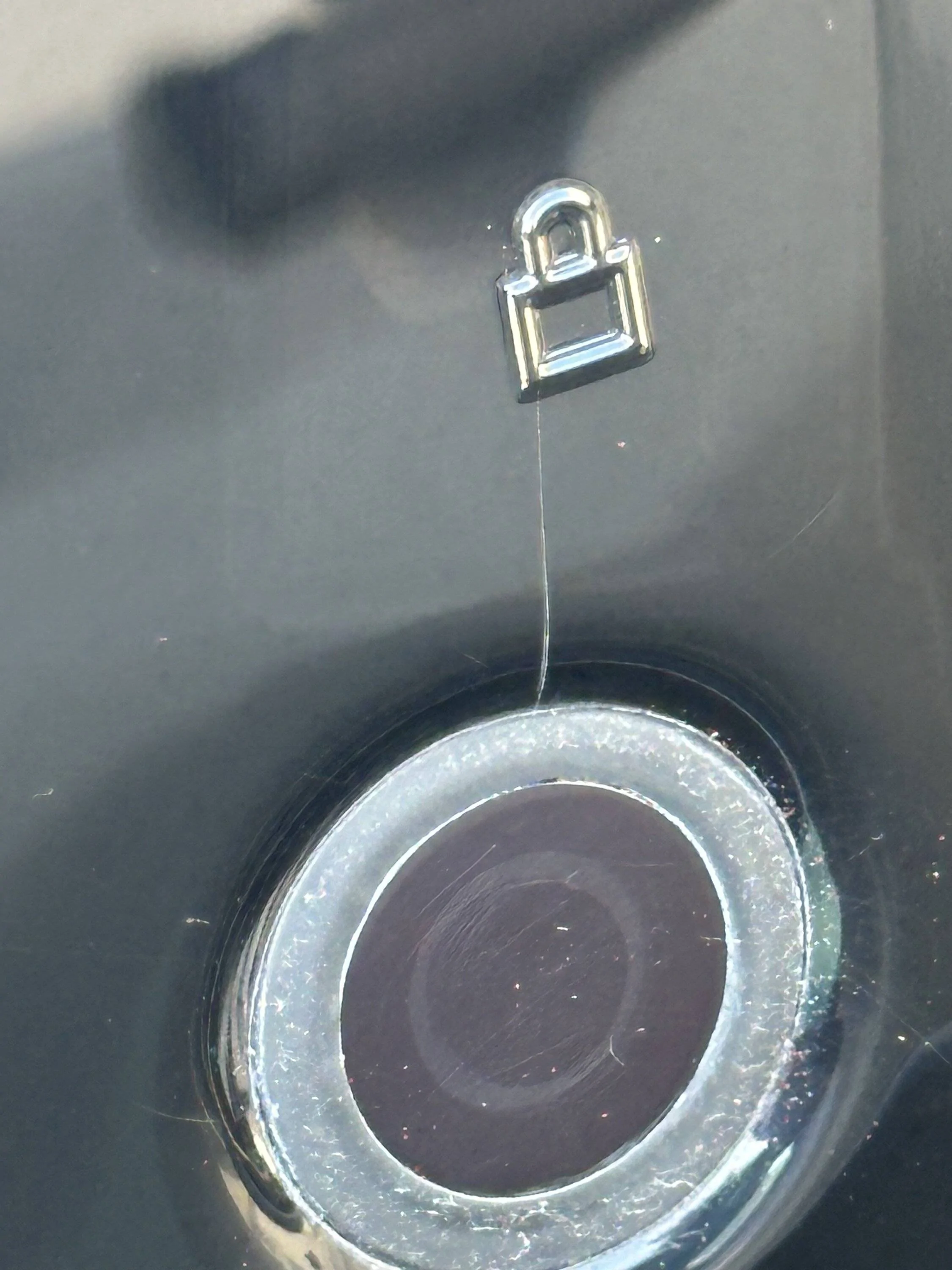 Ford Mustang Mach-E Cracks near the lock button IMG_0988