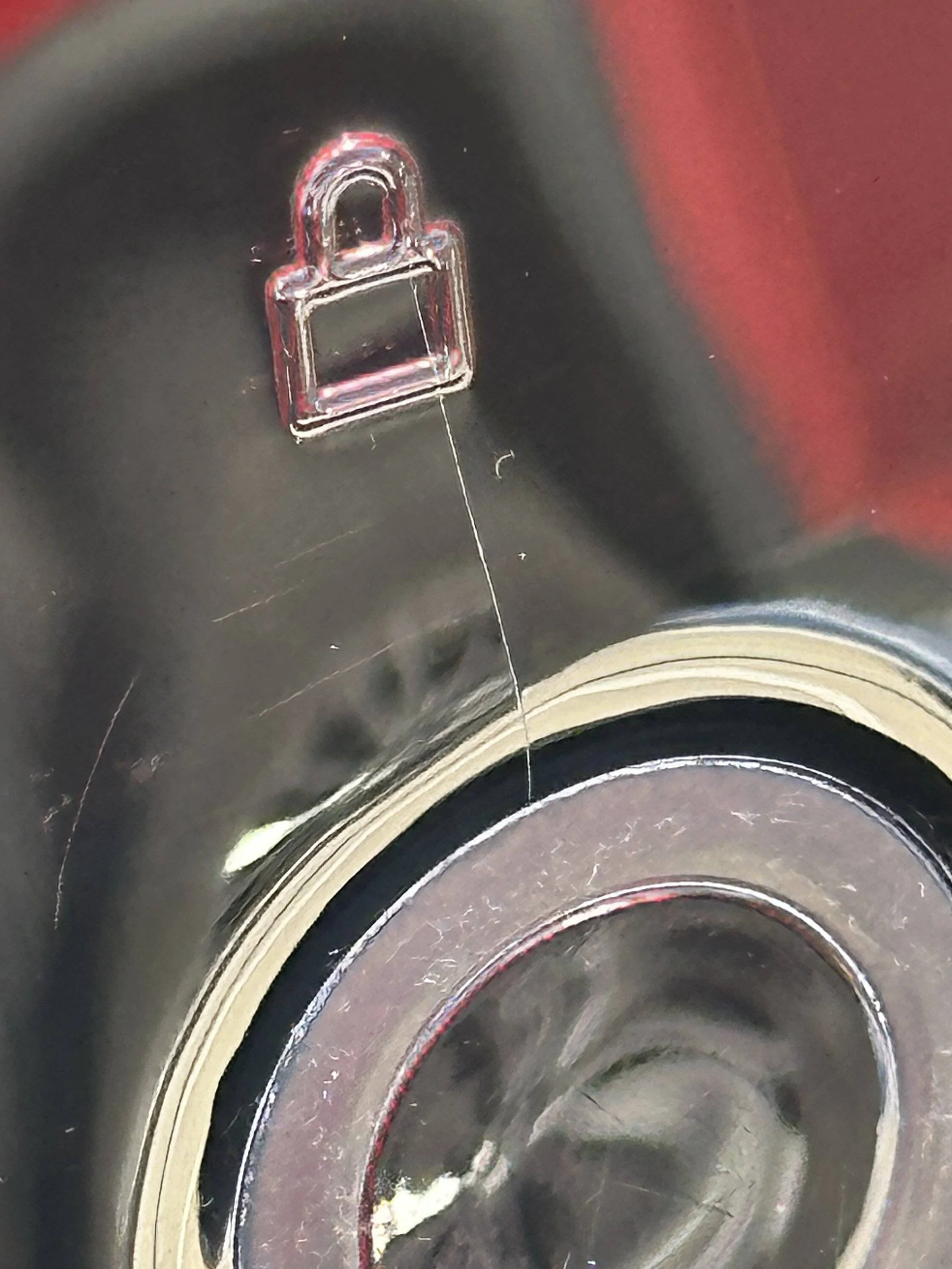 Ford Mustang Mach-E Cracks near the lock button IMG_0987