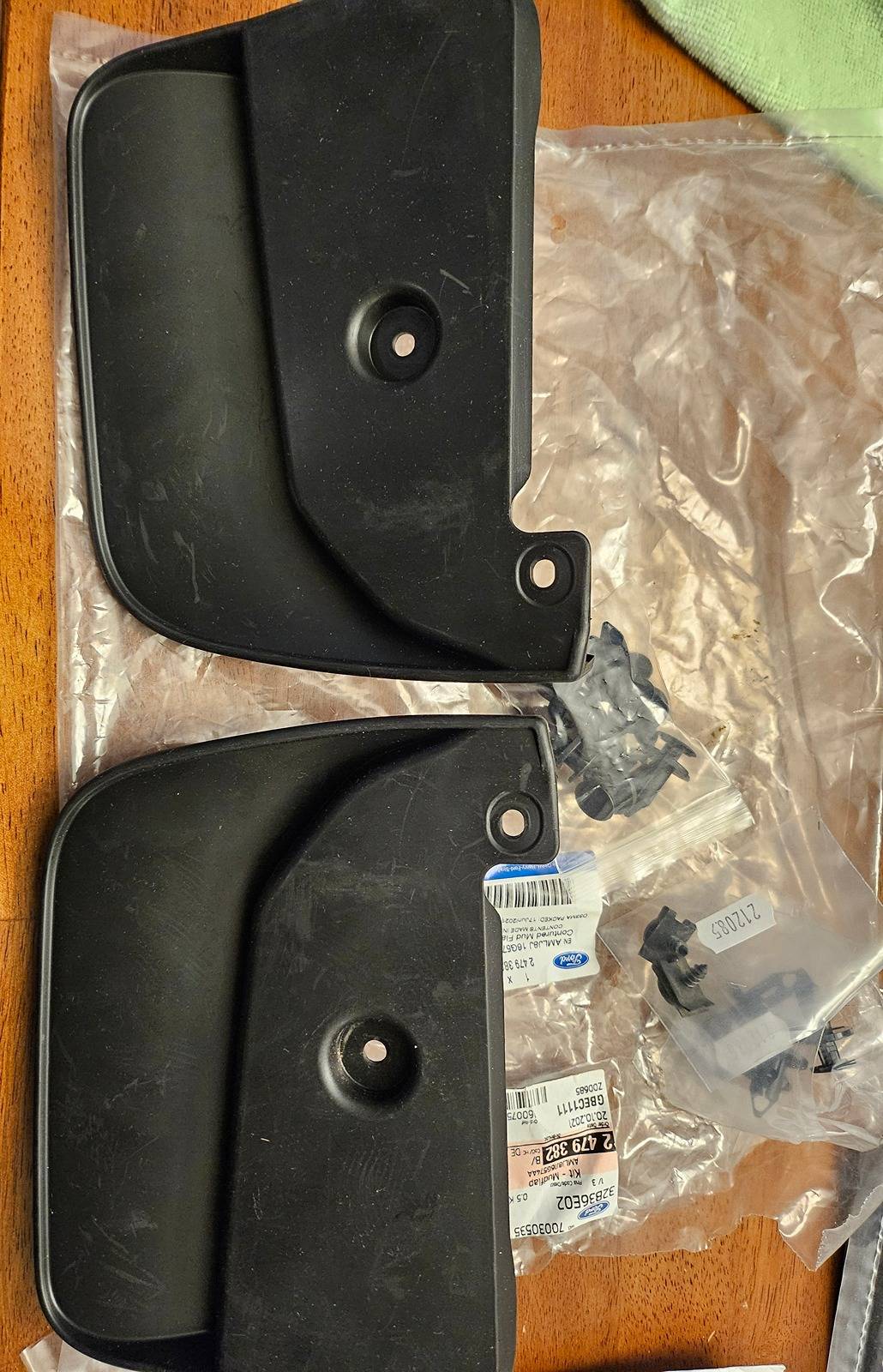 Ford Mustang Mach-E AOSK vs OEM Mud Flaps Comparison (not installed) 20240312_202208