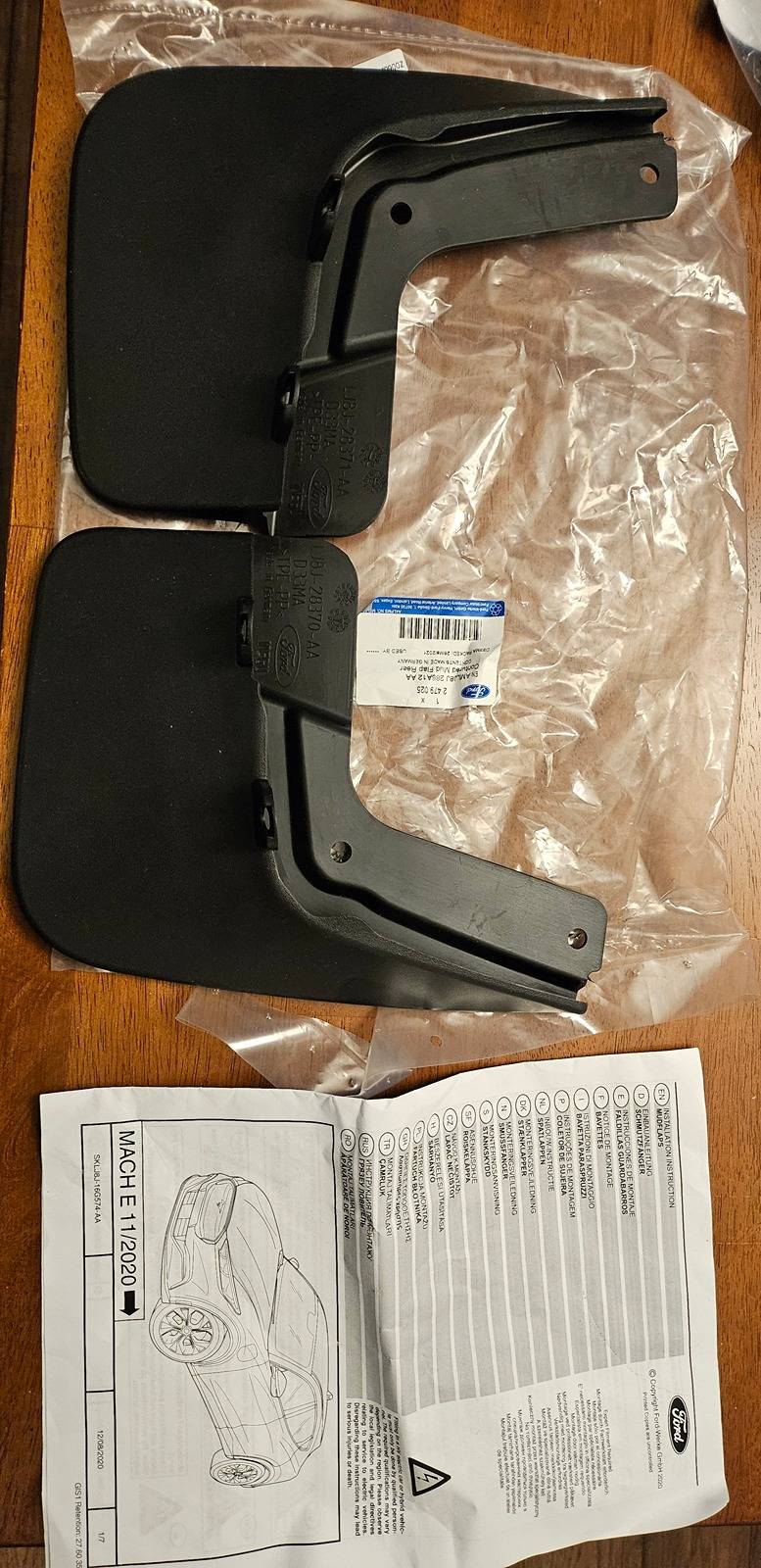 Ford Mustang Mach-E AOSK vs OEM Mud Flaps Comparison (not installed) 20240312_200414