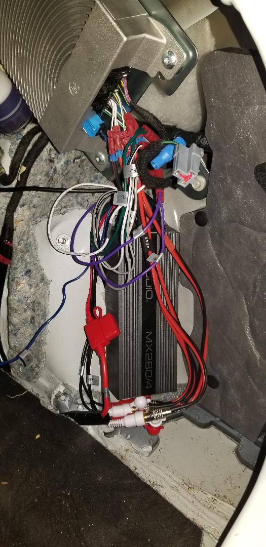 Ford Mustang Mach-E Adding a real subwoofer w/amp to your Mach-E JL small amp replacing the Ford OEM sub inside the trunk right wall