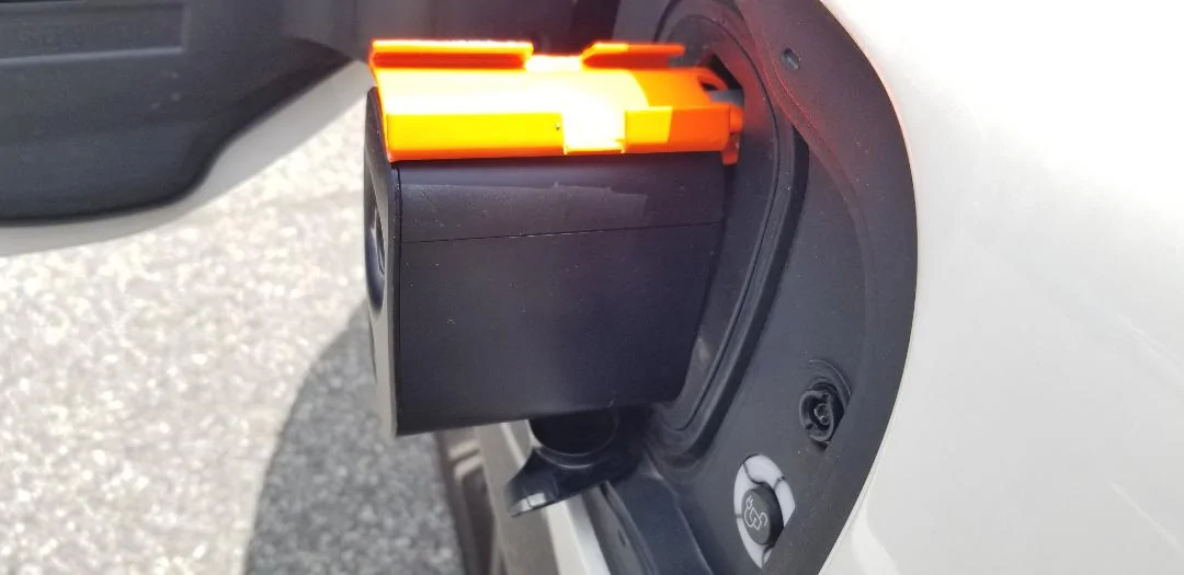 Ford Mustang Mach-E TESLA Adapter + DIY locking plate to keep it secure while plugged in. Tesla adapter and lock plate - in position - side vi