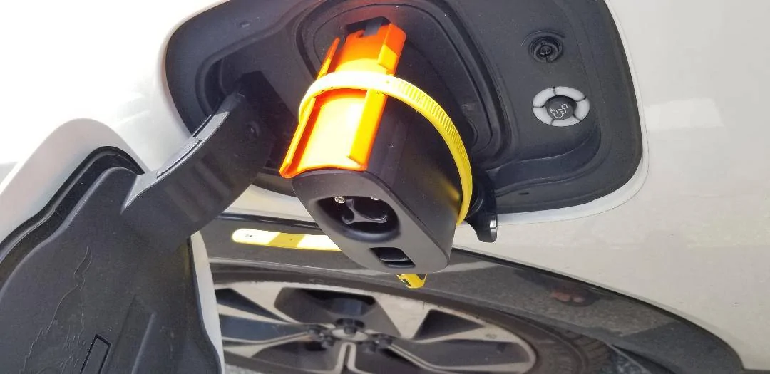 Ford Mustang Mach-E TESLA Adapter + DIY locking plate to keep it secure while plugged in. Tesla adapter and lock plate - in position - locked