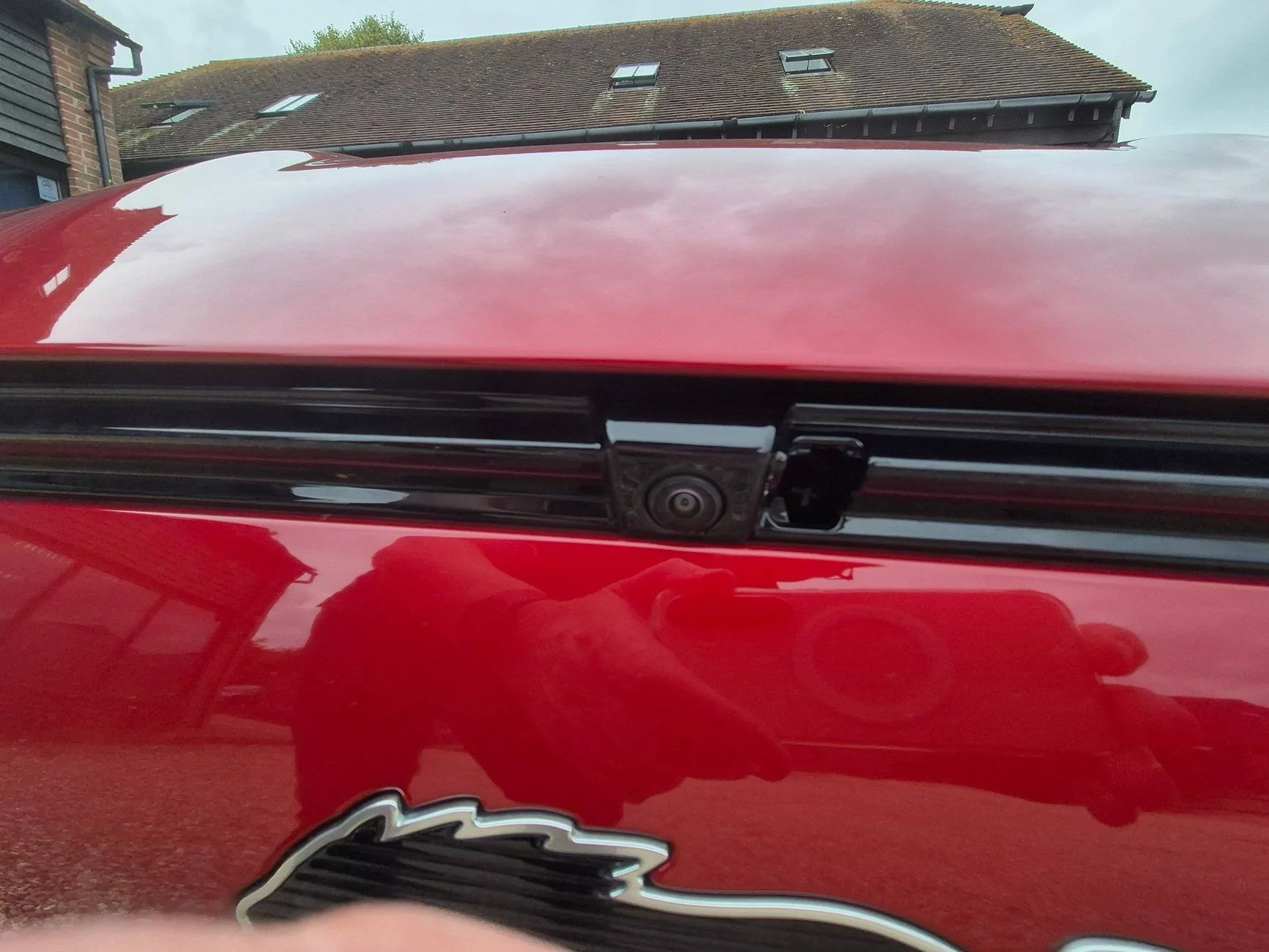 Ford Mustang Mach-E Front camera wash flap 1000016068