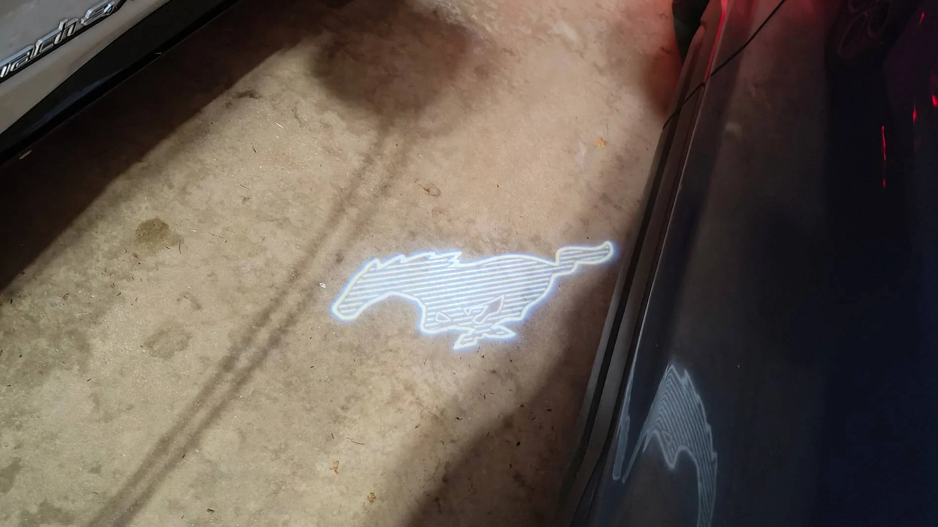 Ford Mustang Mach-E Puddle LAMPS project when mirrors are out (was: I never noticed the floor projection before!) 1000006353