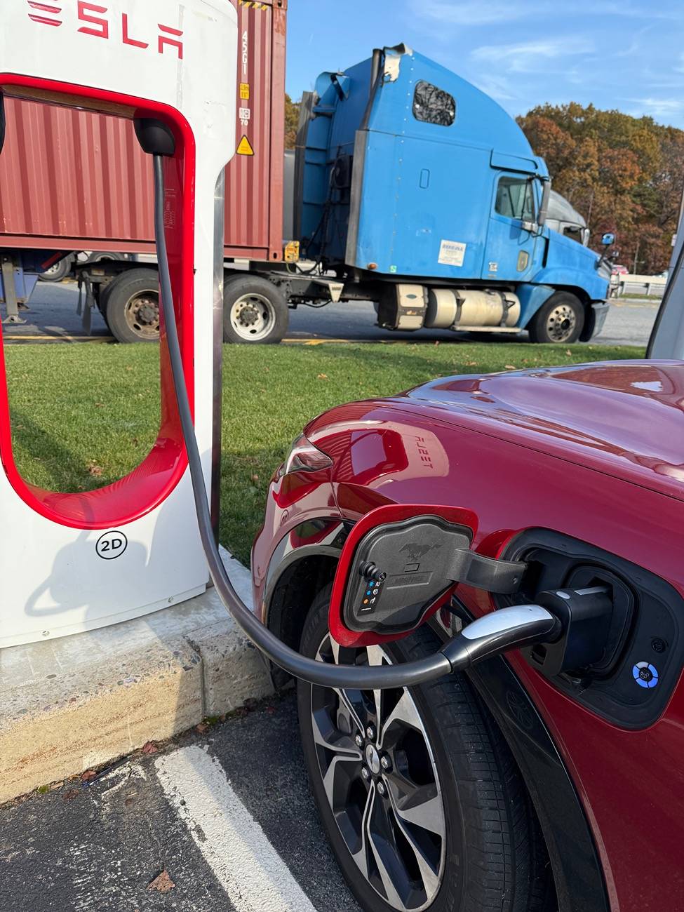 Ford Mustang Mach-E 1st time Tesla charge. Had to angle in for cable to reach IMG_6551