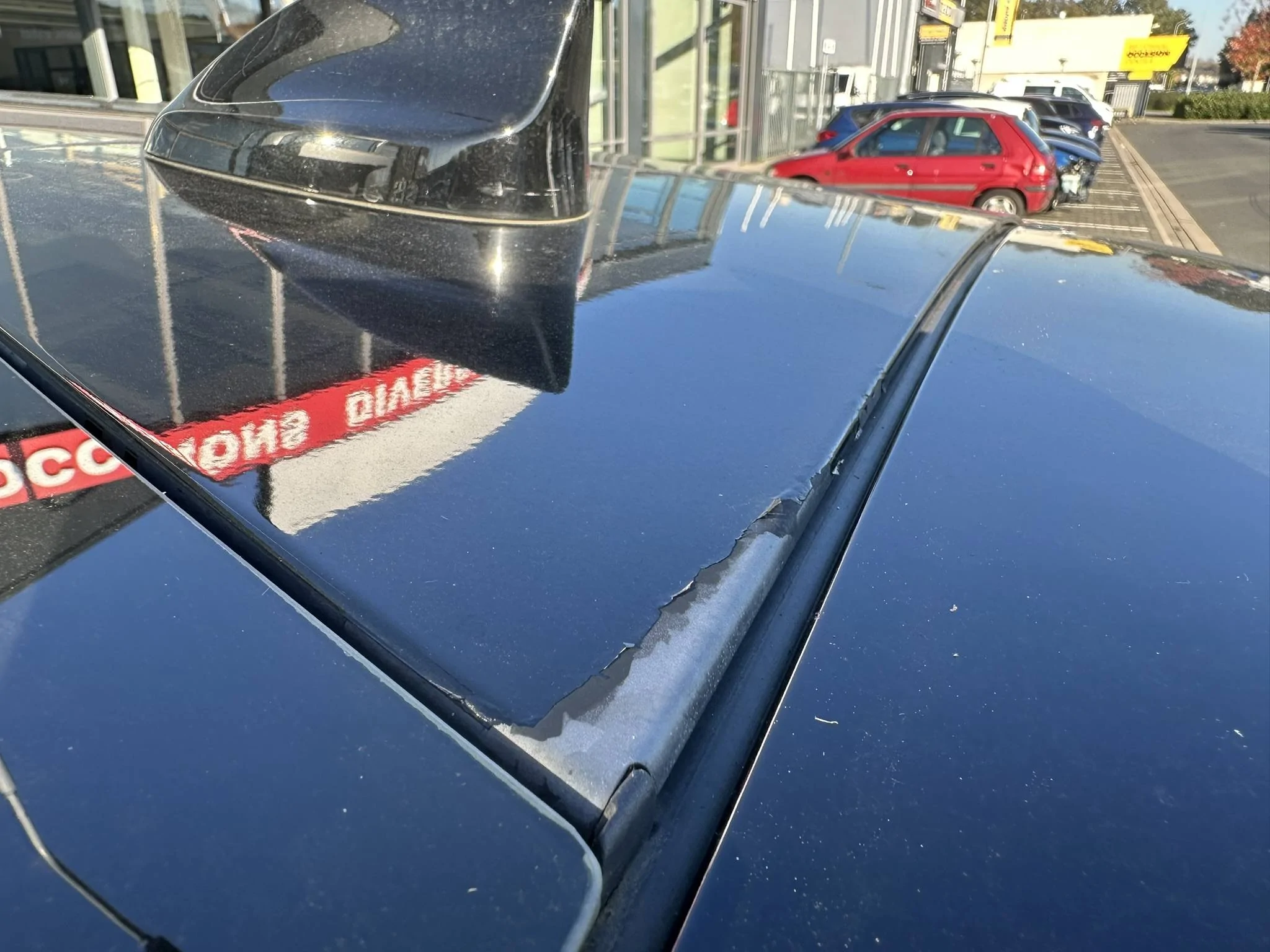 Ford Mustang Mach-E Paint roof antenna peeling off IMG_4762