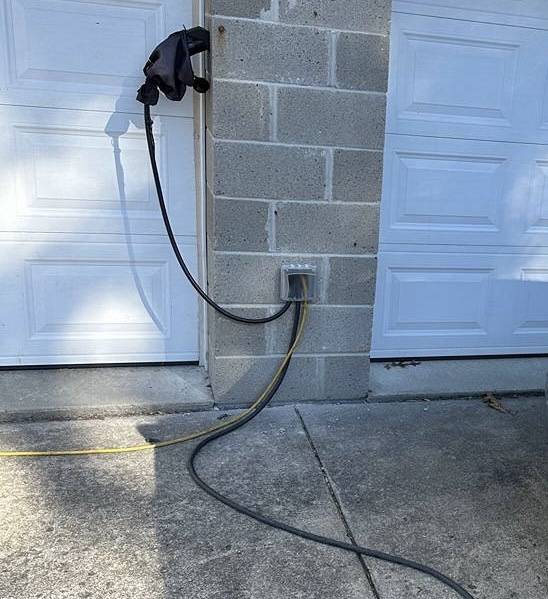 Ford Mustang Mach-E Charger inside / car outside - Garage door solutions? IMG_1092