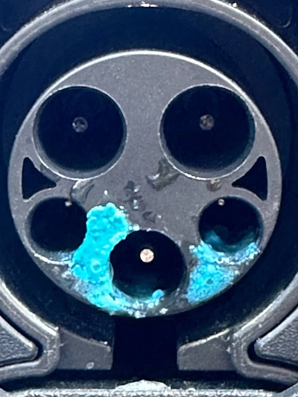 Ford Mustang Mach-E Blue gunk in charging port IMG_4036