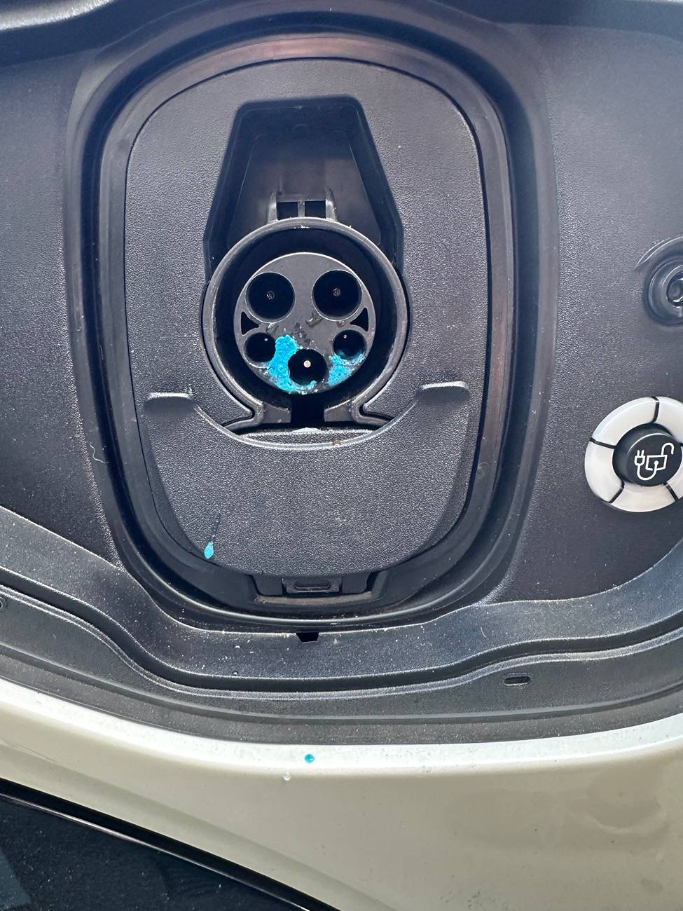 Ford Mustang Mach-E Blue gunk in charging port IMG_4034