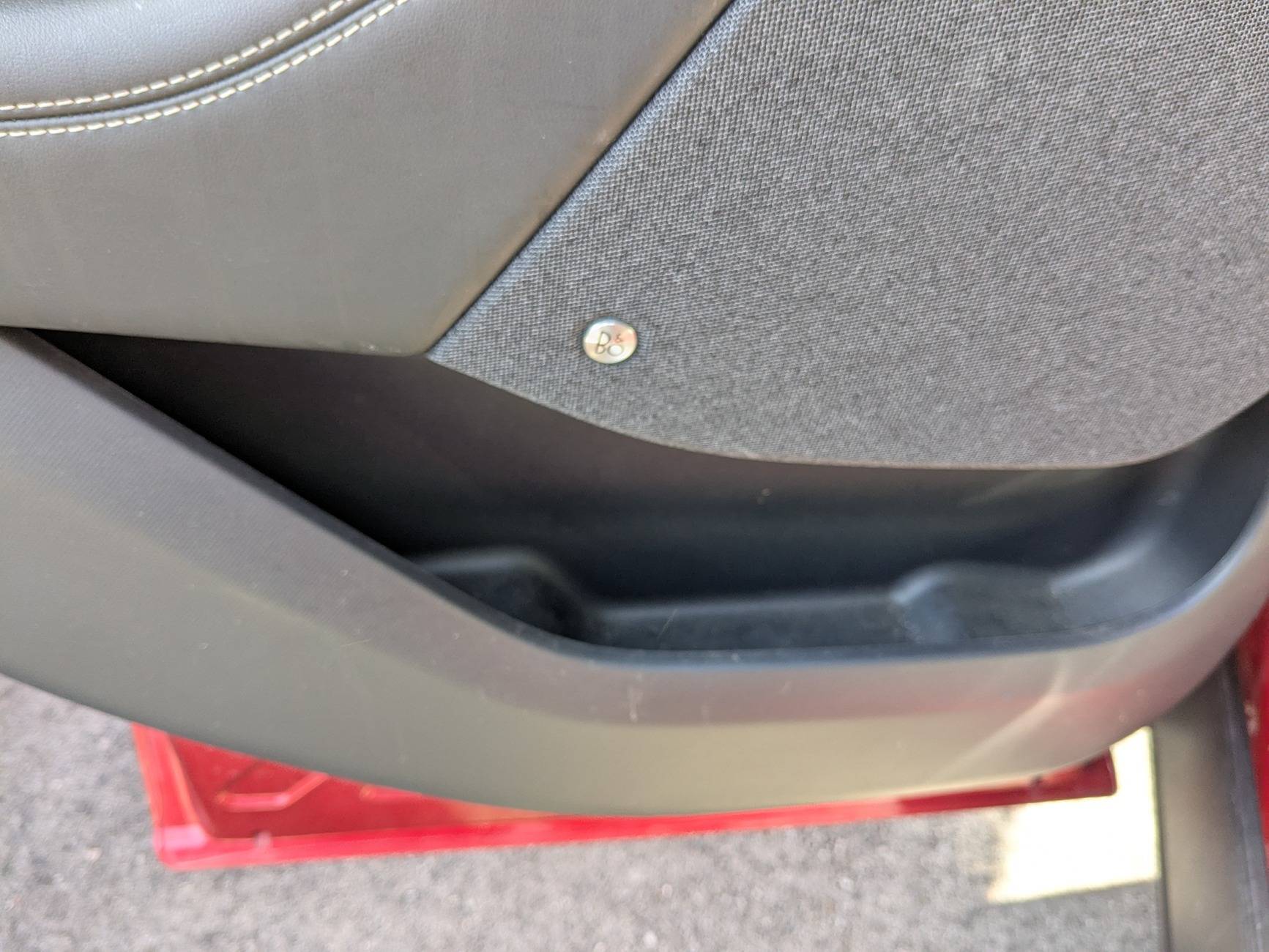Ford Mustang Mach-E NACS adapter holder for center console (3D print) 1. Rear Door Pocket