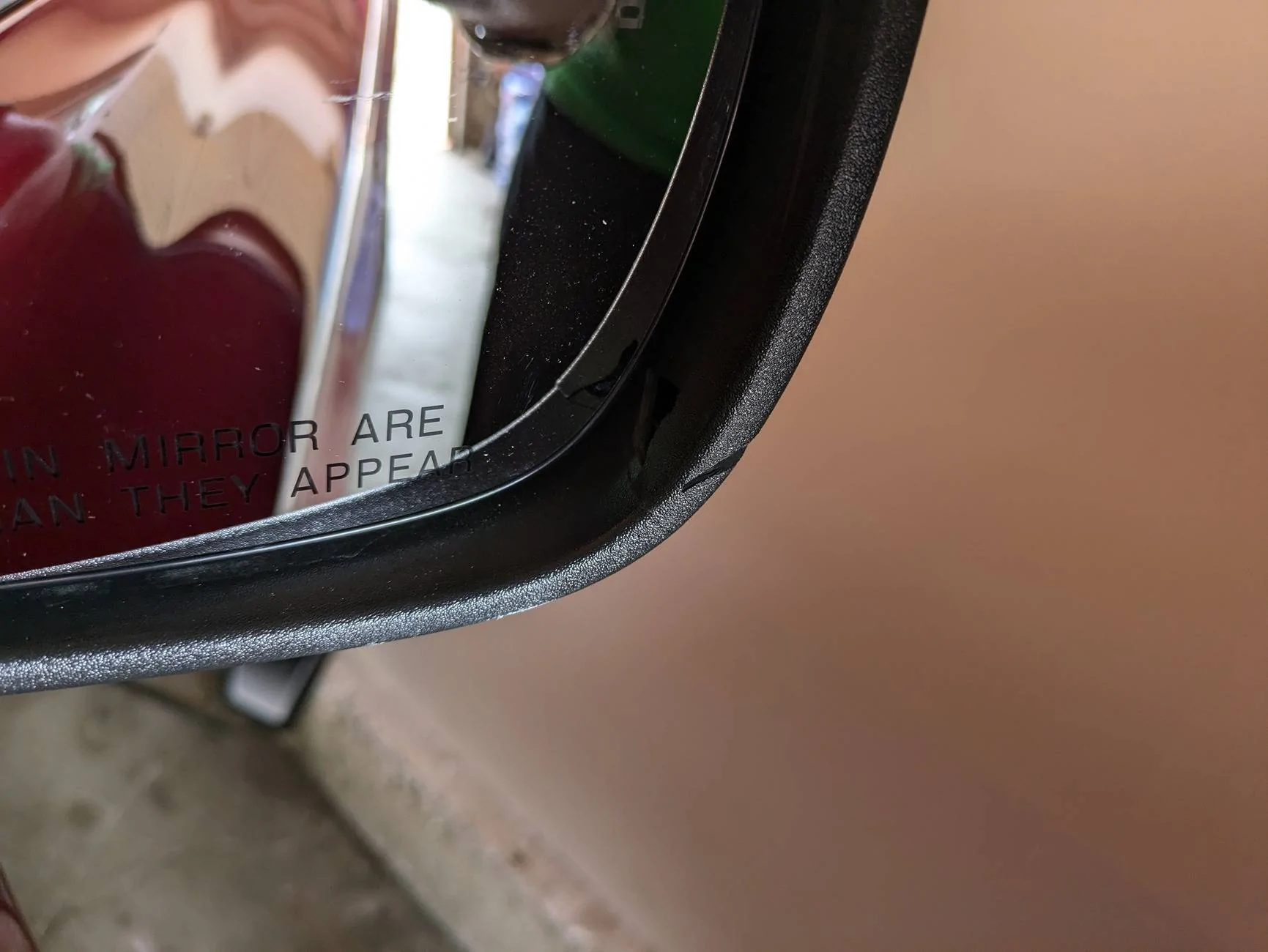 Ford Mustang Mach-E Need help fixing my cracked passenger mirror PXL_20250316_190848044