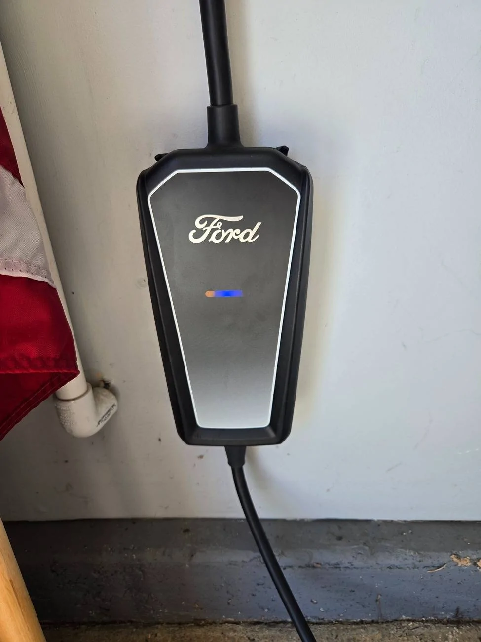 Ford Mustang Mach-E My home charger is giving me these colors and it stops charging. We just had a new plug put in because the got fried. Anybody having this kind of pro 20250409_154311