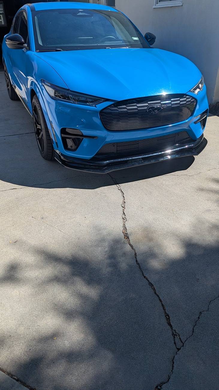 Ford Mustang Mach-E Finally installed some goodies: side louvers, mud flaps and front splitter PXL_20250629_171003061