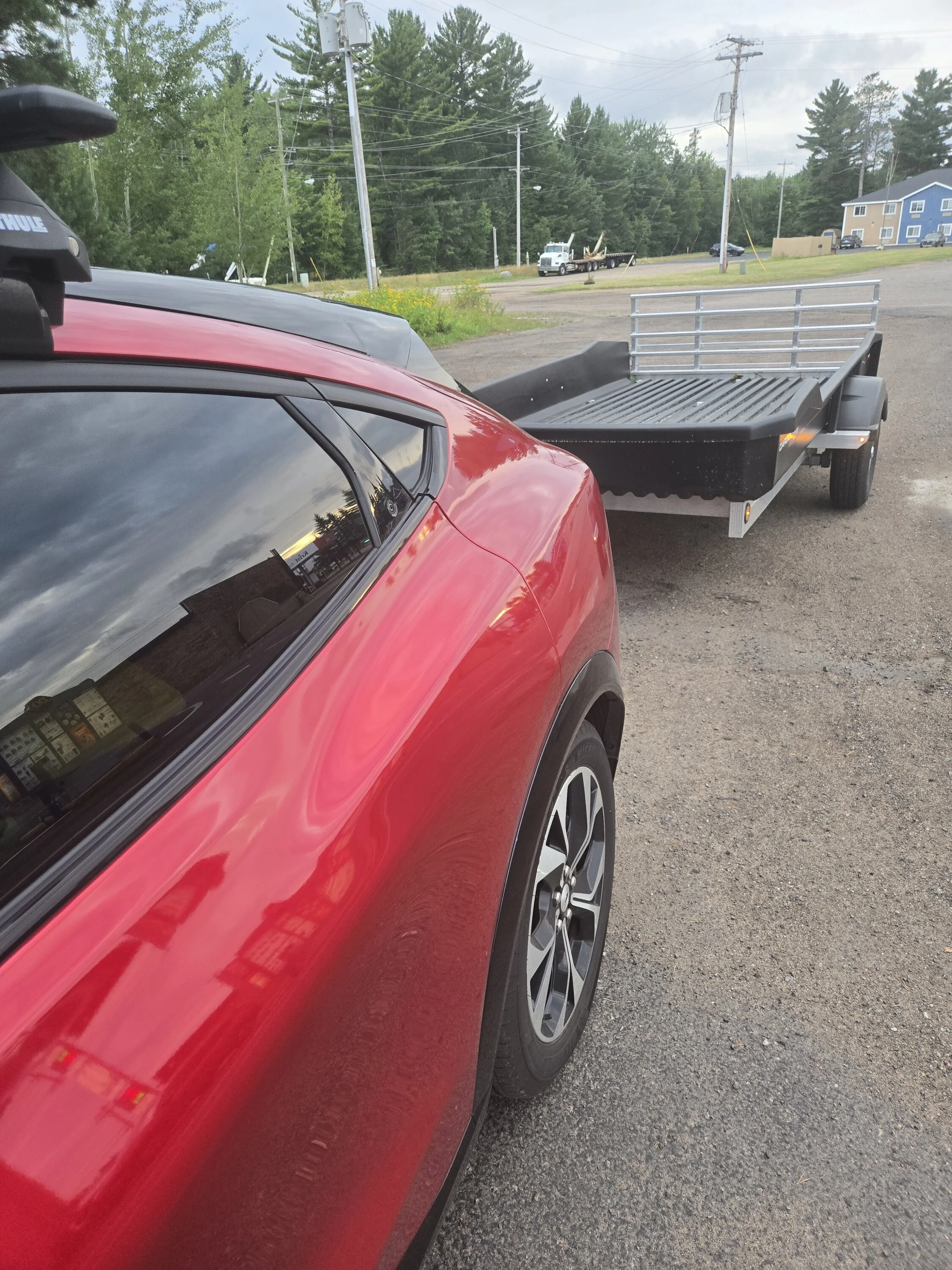 Ford Mustang Mach-E Tow efficiency with atv and trailer. 17548712554203164286994022426780