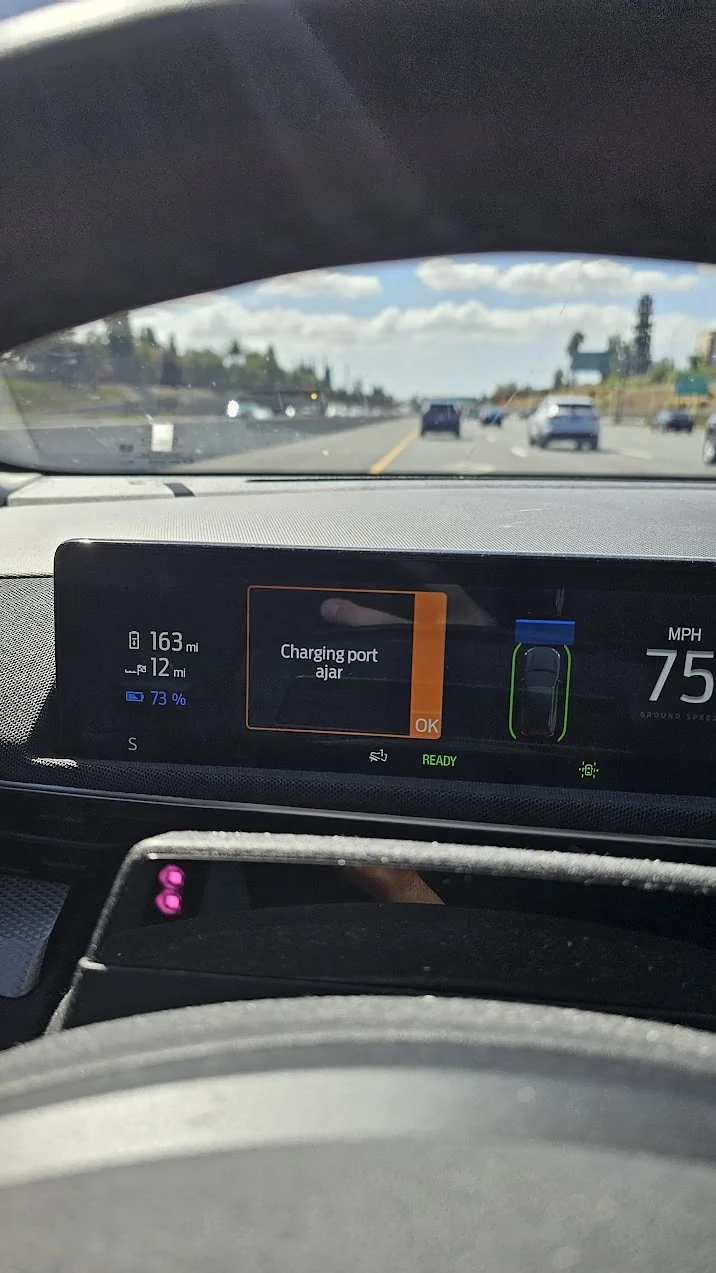 Ford Mustang Mach-E Charging port ajar while driving... 20251004_111955