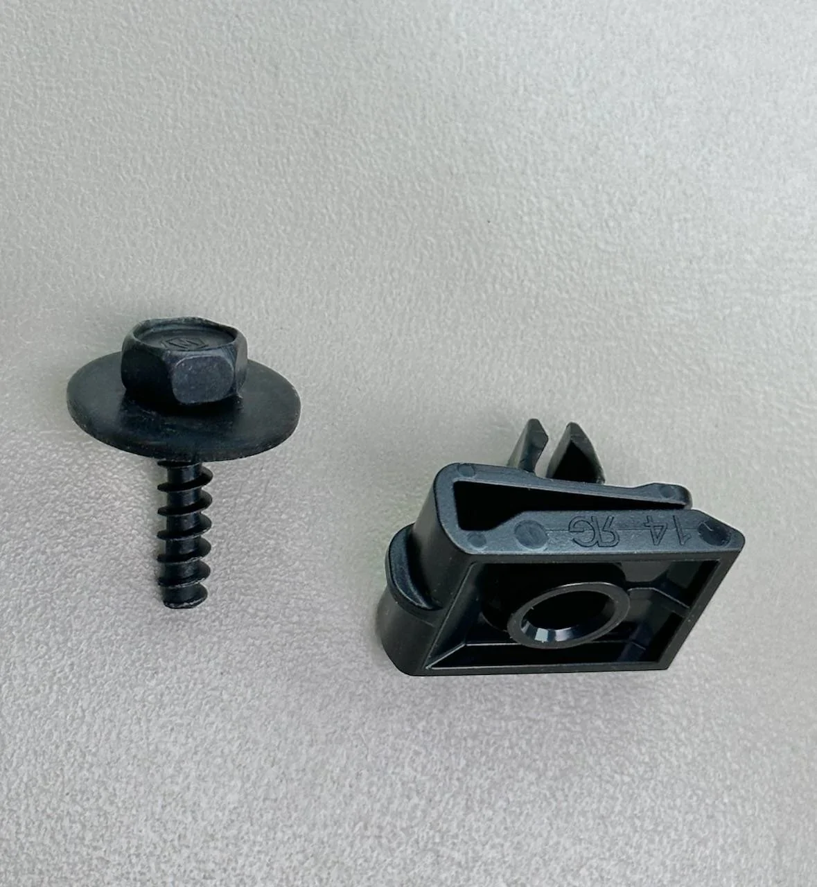 Ford Mustang Mach-E Piece hanging from under carriage 1764309998325-wi