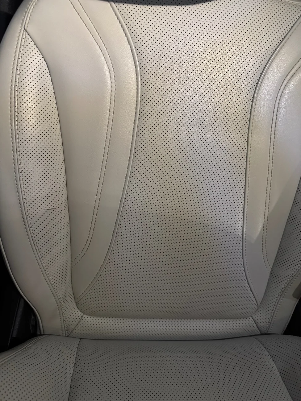 Ford Mustang Mach-E Driver seat leather tearing in just 39K miles IMG_2406