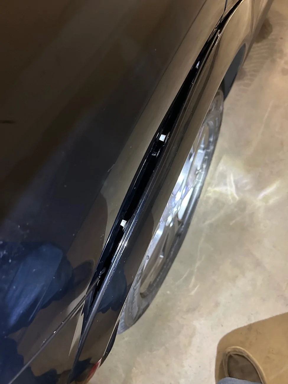 Ford Mustang Mach-E Wheel Arch Trim Popped IMG_1145