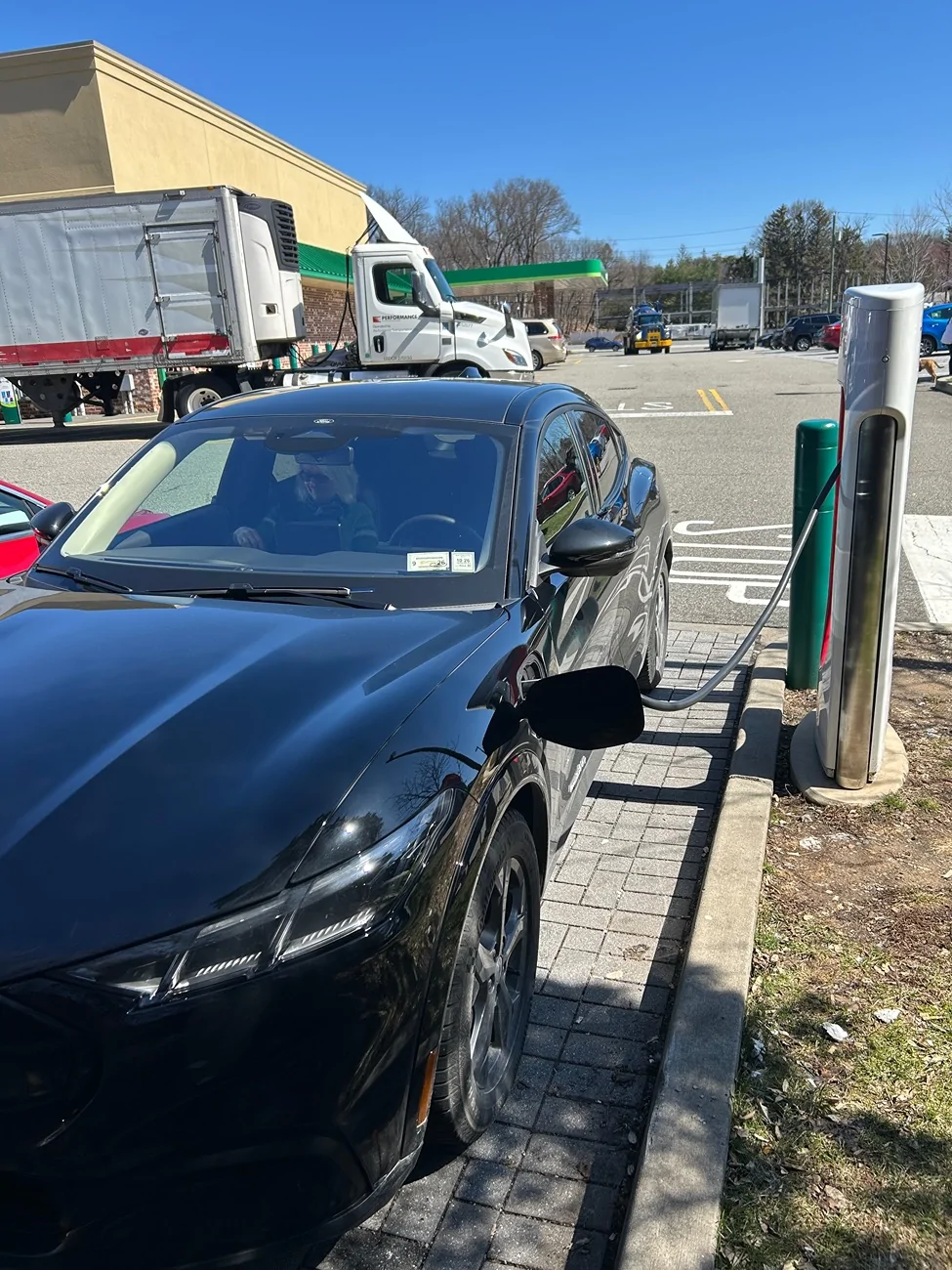 Ford Mustang Mach-E Charging at a Tesla Super charger IMG_1309