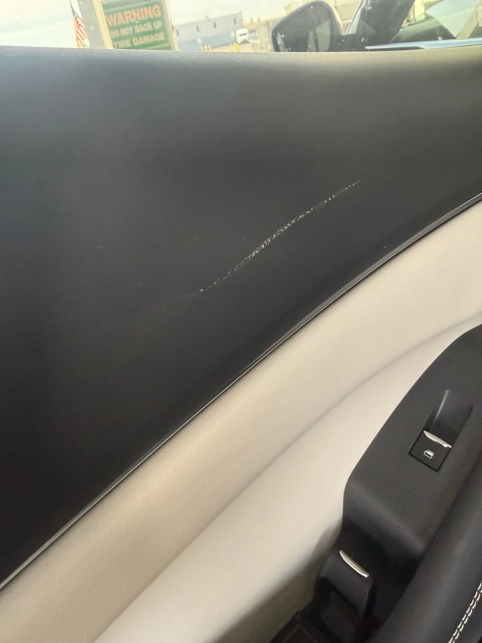 Ford Mustang Mach-E Gouged Door Trim Panel IMG_7263