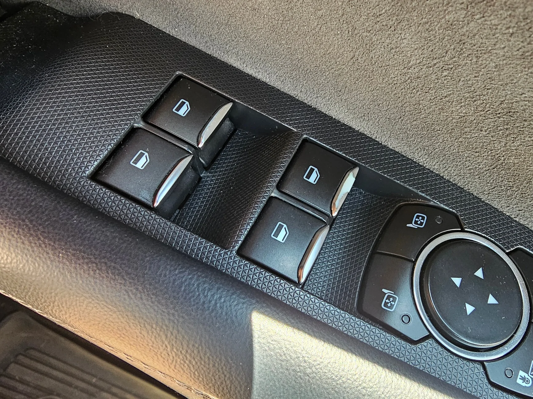 Ford Mustang Mach-E How to replace the peeling chrome window switch tips. 20260722_135016