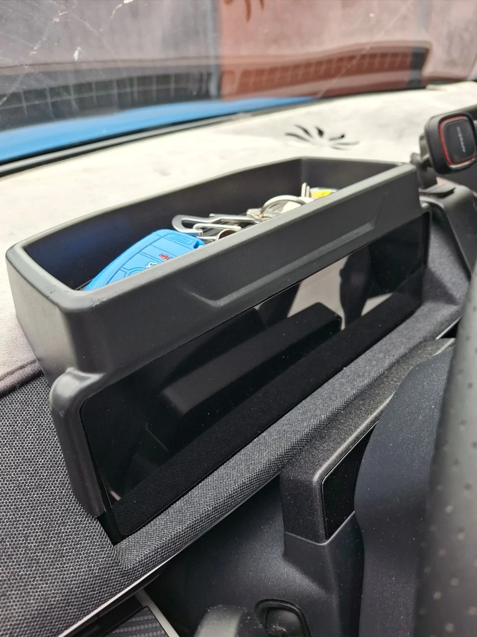 Ford Mustang Mach-E Behind the screen storage tray Screenshot_20260804_073759_Gallery
