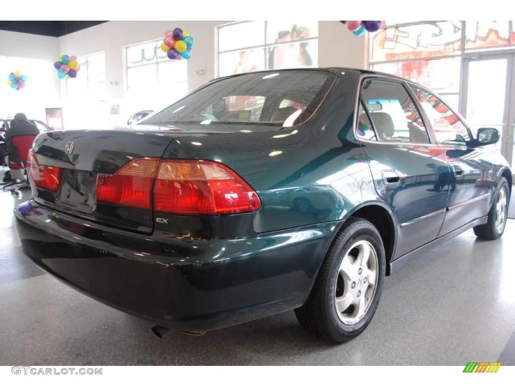 Ford Mustang Mach-E Mach-E wrapped in Dark Green Pearl 3M vinyl wrap R1cbcd119ec3c16271fc0d55bb19ce370