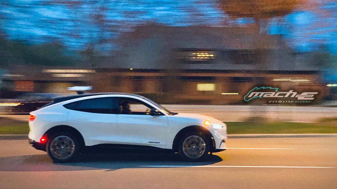 Ford Mustang Mach-E STAR WHITE METALLIC Mach-E Photos white-mustang-mach-e in motion