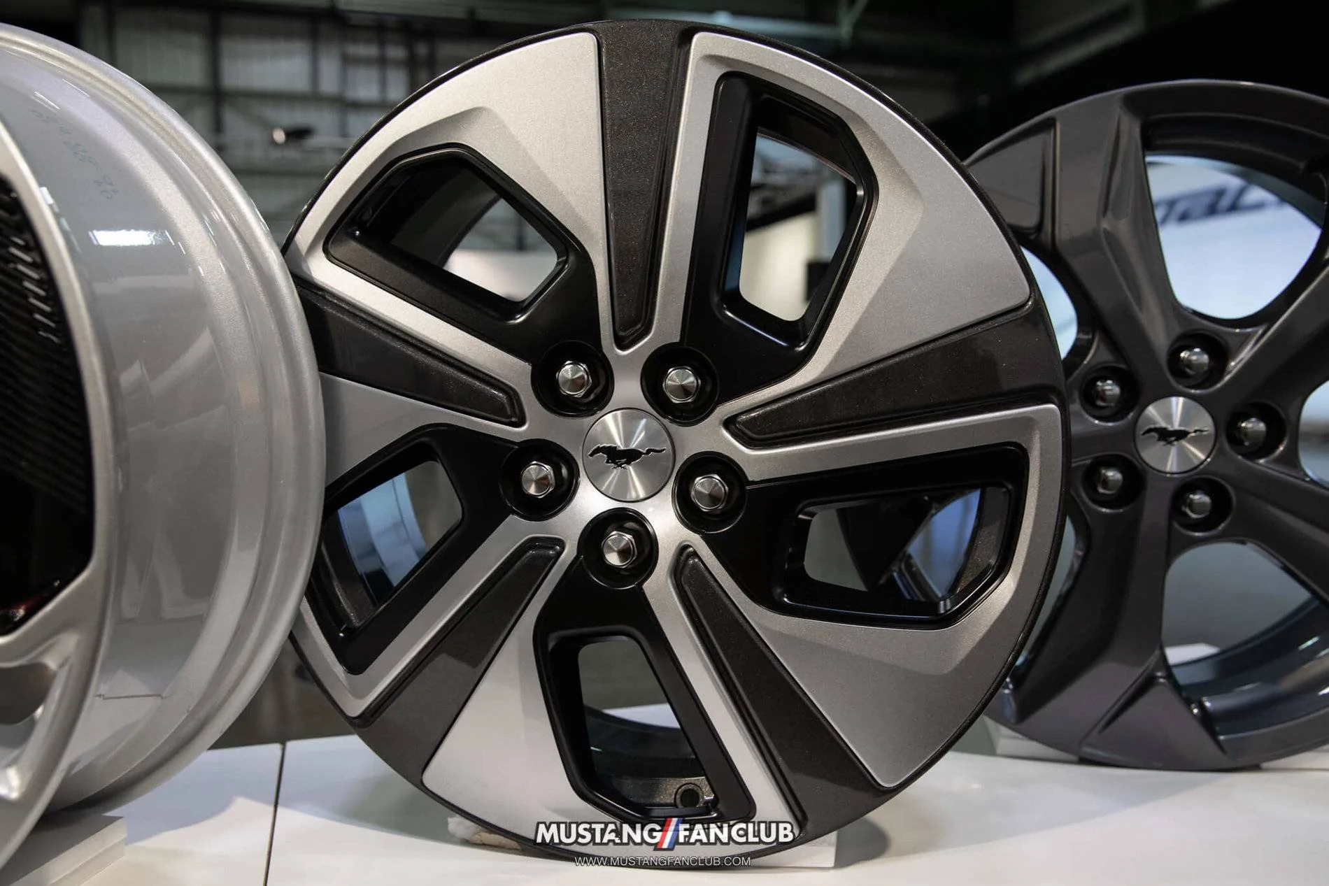 Ford Mustang Mach-E Closeup Looks at Mach-E Factory Wheels Options, Seats, Stitching, Cabin Environment 2021 Mach-E 18″ High Gloss Black Aluminum Wheel w: Low Gloss Black Aero Cover (Standard on Ca
