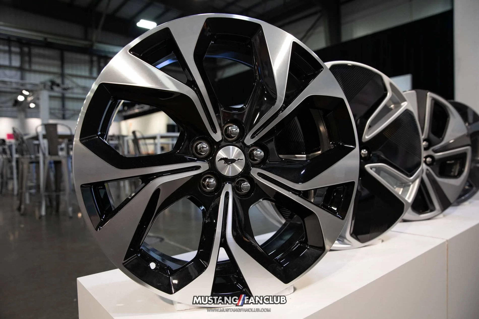Ford Mustang Mach-E Closeup Looks at Mach-E Factory Wheels Options, Seats, Stitching, Cabin Environment 2021 Mach-E 19″ Machined-Face Aluminum Wheels w: High Gloss Black Pockets (Standard on Premiu