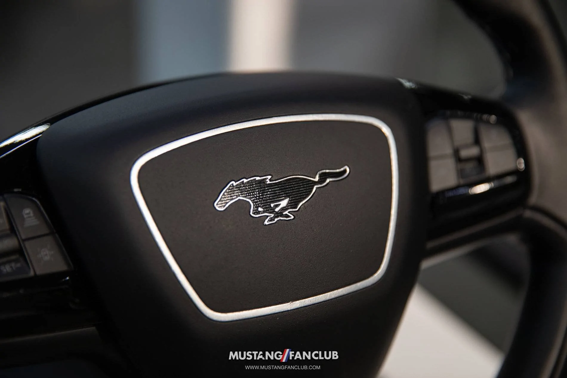 Ford Mustang Mach-E Closeup Looks at Mach-E Factory Wheels Options, Seats, Stitching, Cabin Environment 2021 Mustang Mach-E Steering Wheel Closeup1