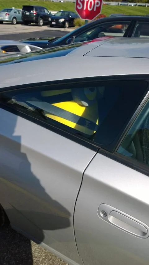 Ford Mustang Mach-E hey, I have a car! 2013-10-20 Minion in passenger seat (Small)