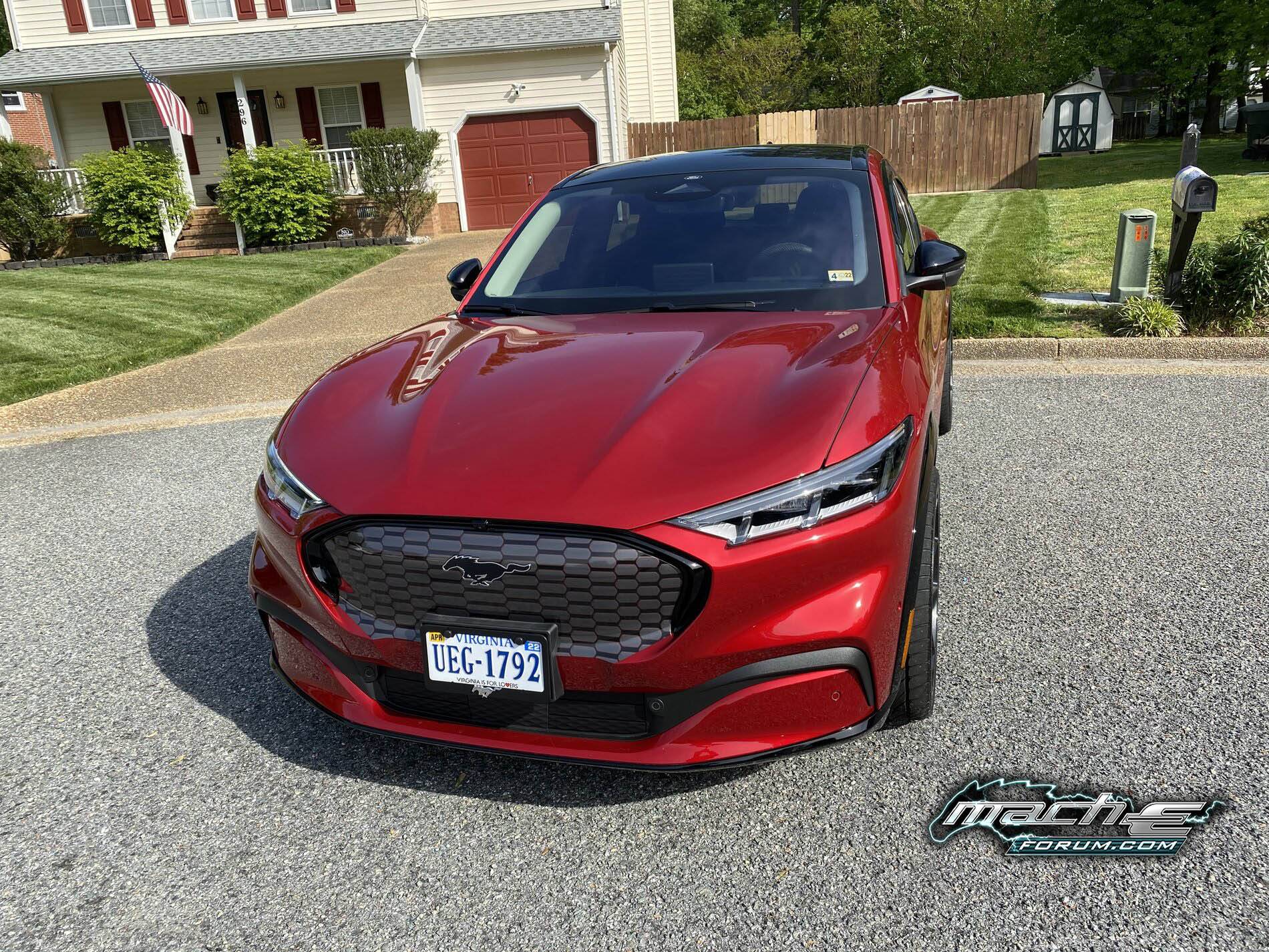 2021 Mach-E Modified Rapid Red Metallic 20%22 black wheels 2.jpeg