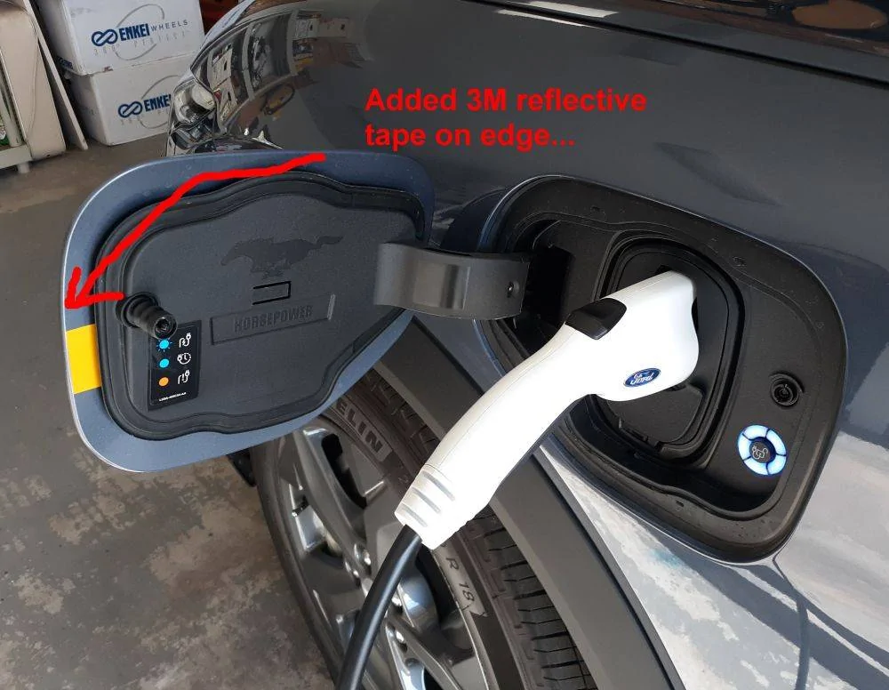 Ford Mustang Mach-E Charging port door - flimsy or solid? 20210320 reflective insid