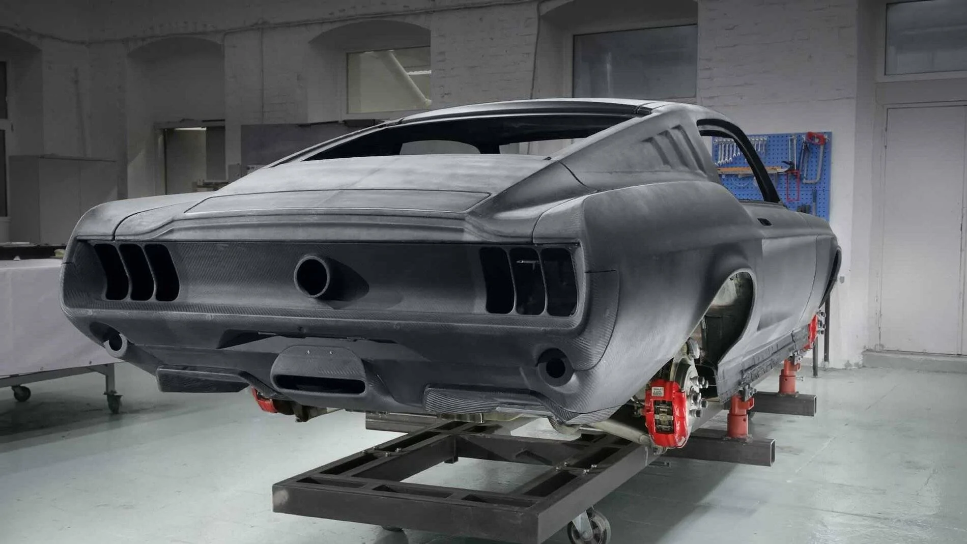 Ford Mustang Mach-E Admit it. You want this aviar-r67-all-electric-mustang-concept-chassis-rear