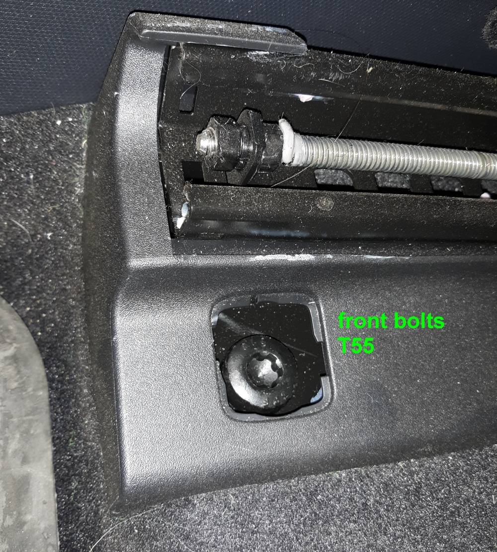 Ford Mustang Mach-E in progress - replacing front seats with aftermarket 02 removal - front T55