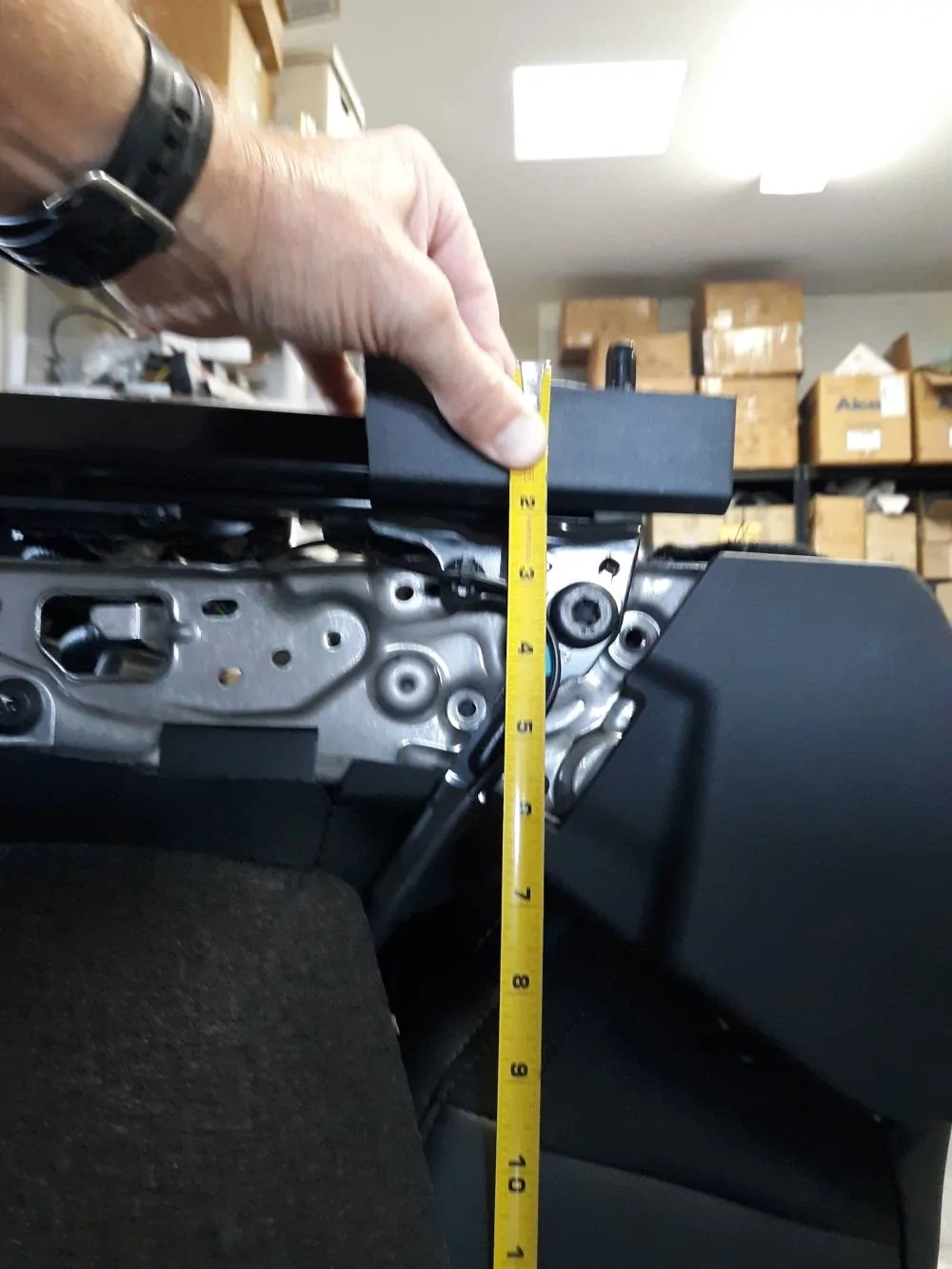 Ford Mustang Mach-E in progress - replacing front seats with aftermarket oem 02 seat to rear foot 7in