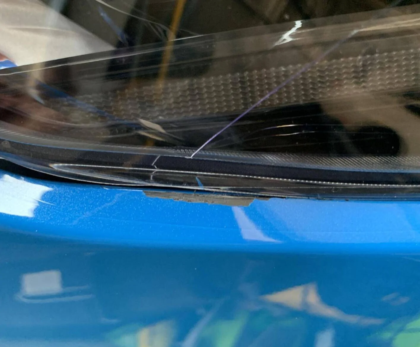 Ford Mustang Mach-E Paint rubbing off underneath the headlights. 1631752908036