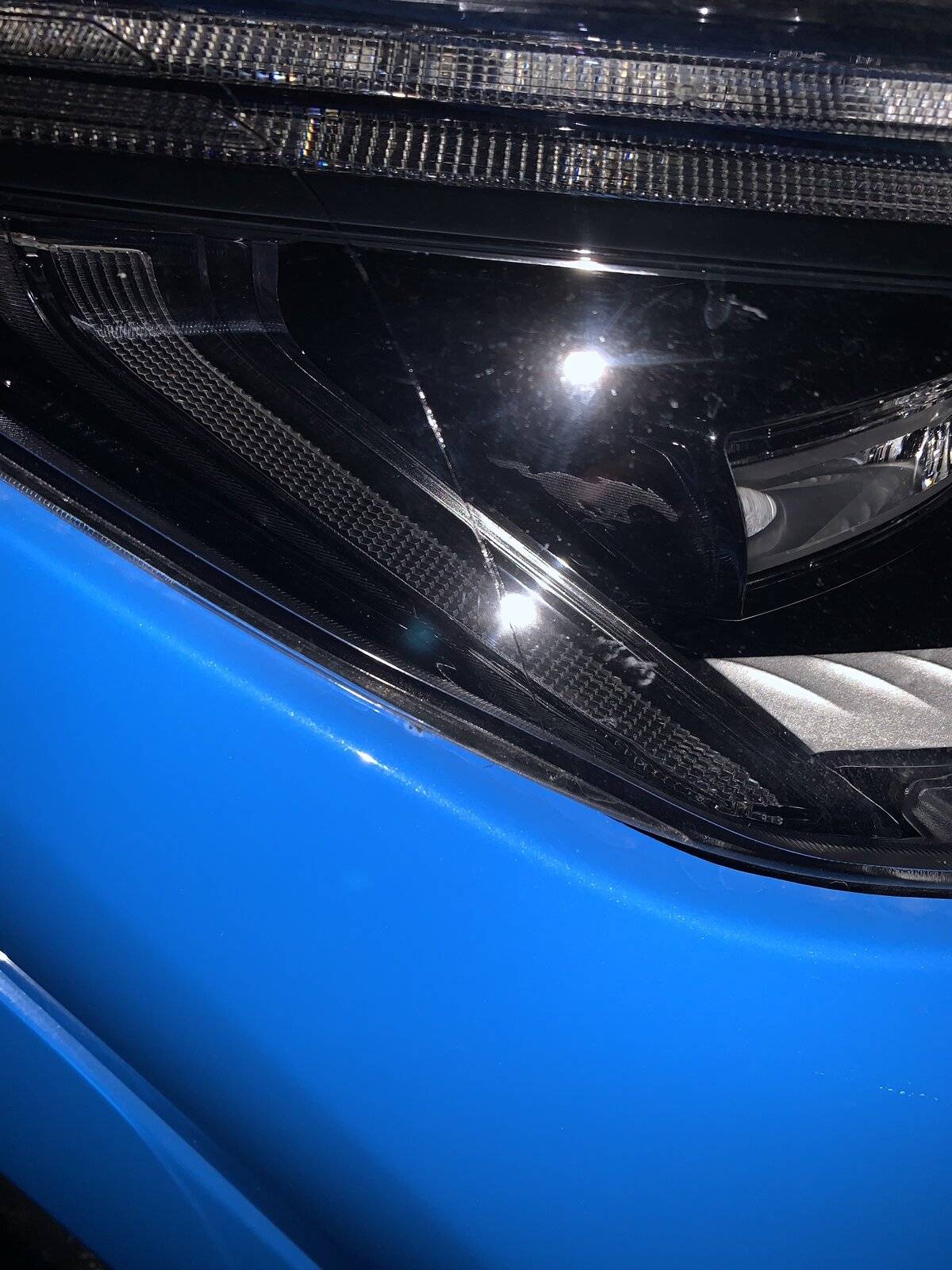 Ford Mustang Mach-E Paint rubbing off underneath the headlights. 9FE32122-091A-4217-9EC6-7D3B452B2AC5